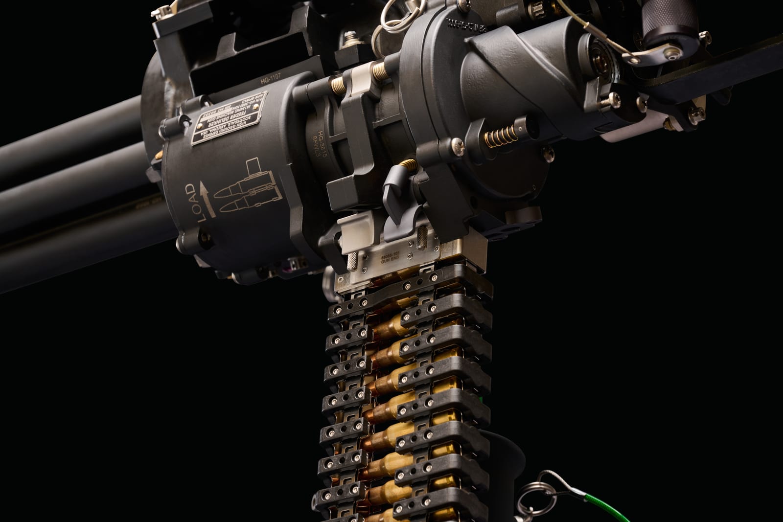 Crew-served M134-class weapon system on its mount